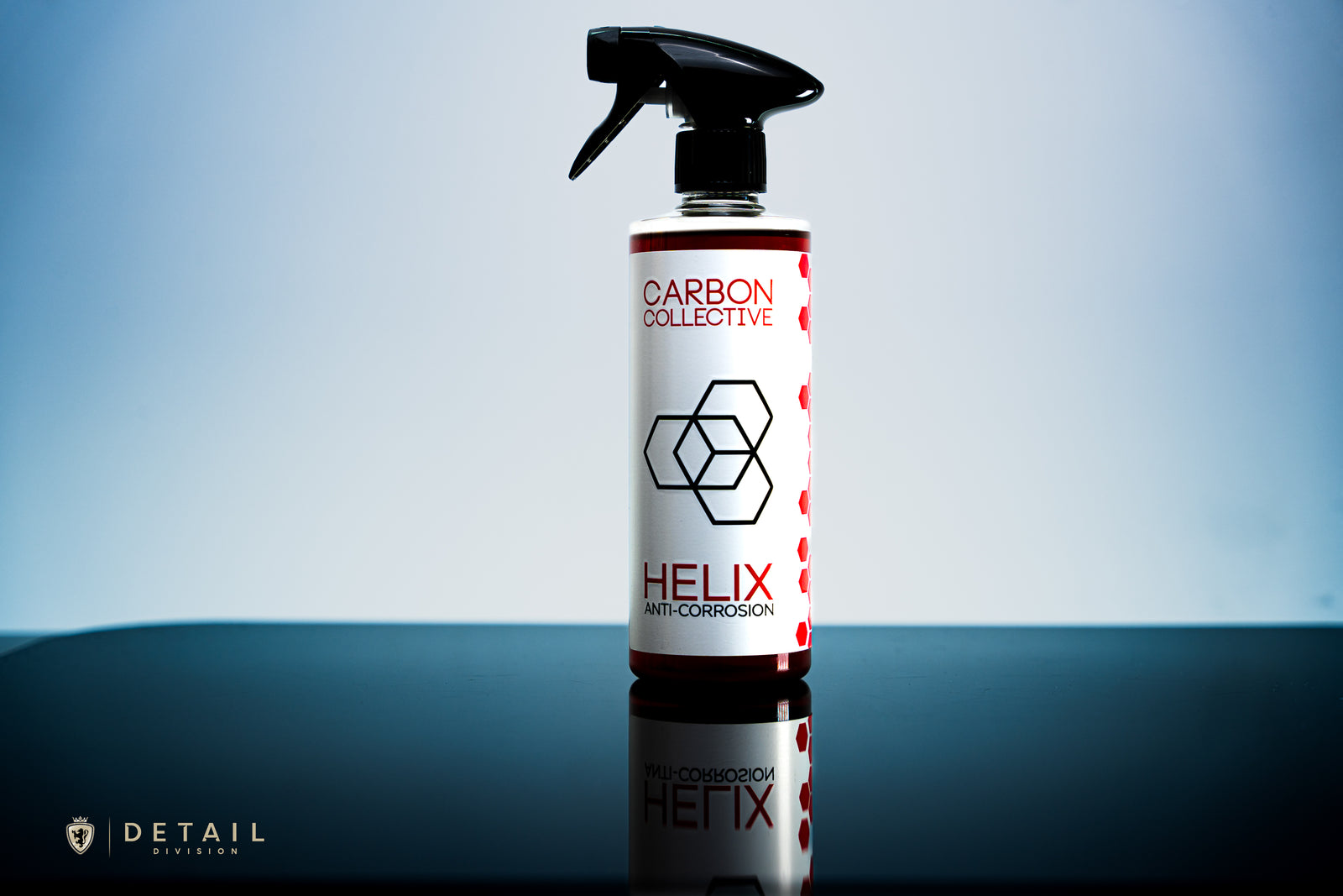 A bottle of Carbon Collective HELIX Anti-Corrosion spray to inhibit corrosion on metal