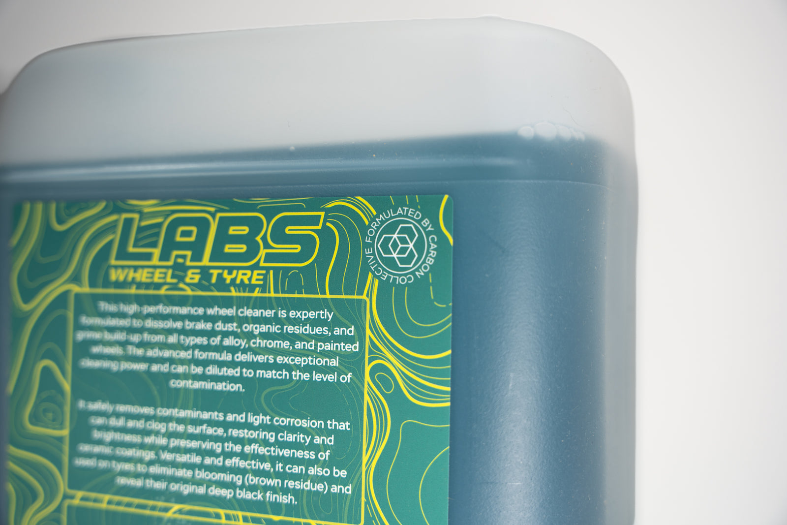 Labs Wheel & Tire Macro Rear Label Detail Shot 'Formulated by Carbon COllective' with partially included instructions 5L Jug